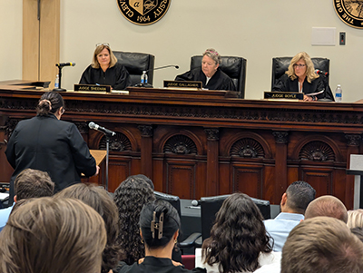 Judge Michelle J. Sheehan, Judge Eileen A. Gallagher and Judge Mary J. Boyle on the judge's bench