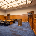 View from northeast corner of remodeled Courtroom 3 featuring open and adaptable space to accommodate different needs and multiple purposes uses, including court proceedings, training events and large group meetings.